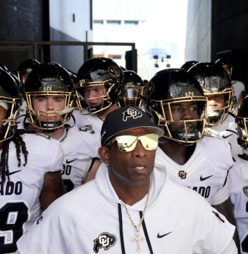 COLRADO HEAD COACH-PRIME-LEADS-TEAM - AP PHOTO